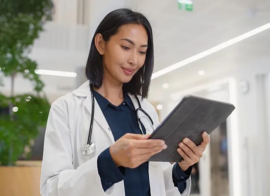 portrait-asian-female-general-practitioner-using