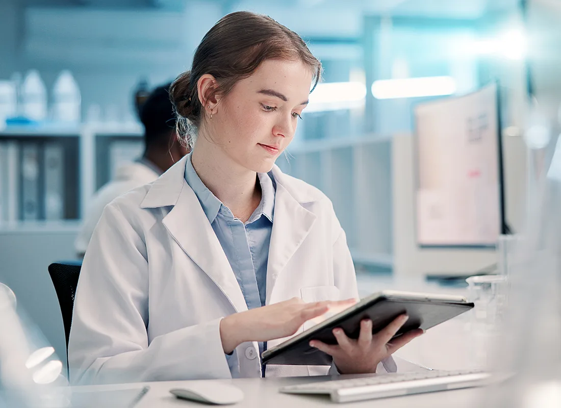 science-student-woman-on-tablet