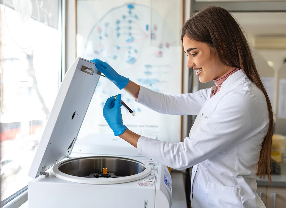 scientist-worker-laboratory-technician-using-centrifuge